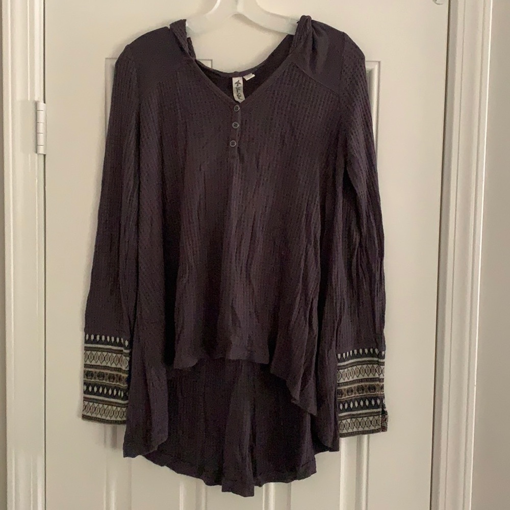 Women’s sweater with hood.